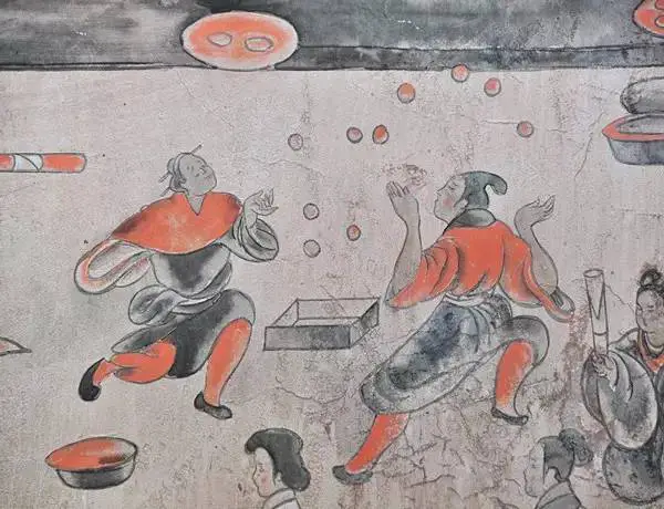 Another mural from the Eastern Han Dynasty Dahuting tomb. Street performers with Ku